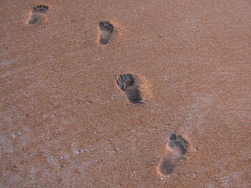 foot steps beach imprint