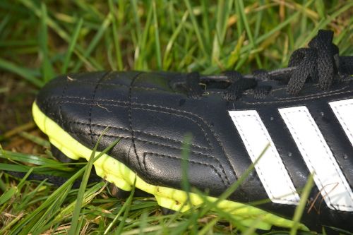 football boots shoe grass