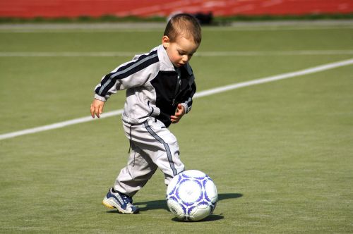 footballer ball boy