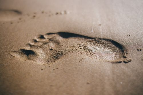 footprint beach sand