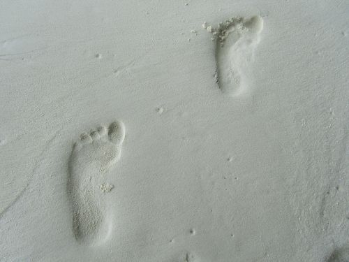footprint feet tracks in the sand