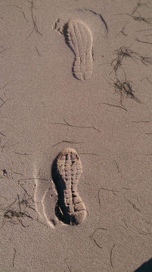 footprints sand north sea