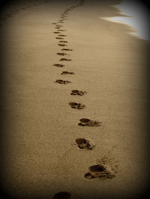 footprints sand beach