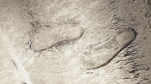 footprints sand beach