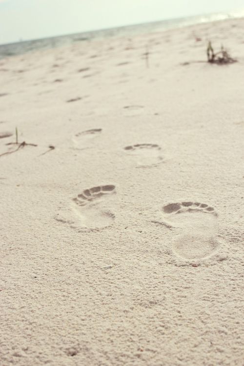 footprints sand beach