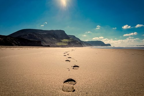 footsteps  beach  sand