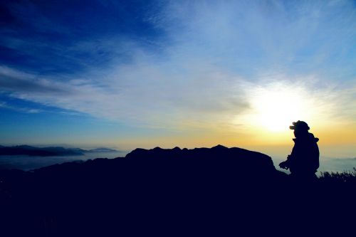 four people with silhouette alpine