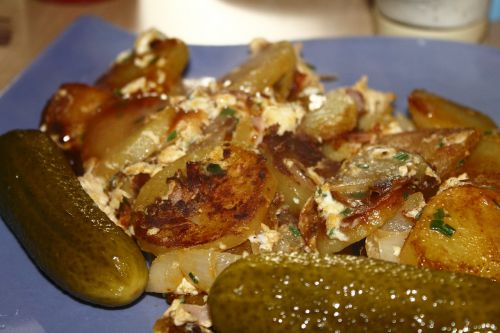 fried potatoes pickled gherkin eat