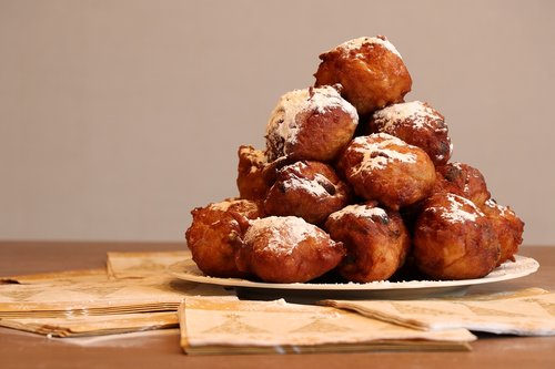 fritters  old and new  powdered sugar