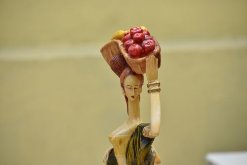 fruit seller woman statue