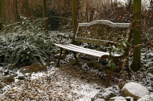garden bench winter snowfall