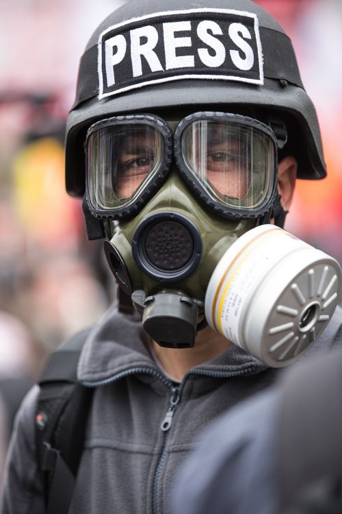 gas mask press journalist
