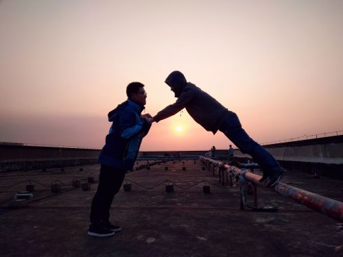 gay roof sunset