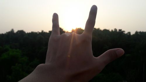gesture hand sunlight