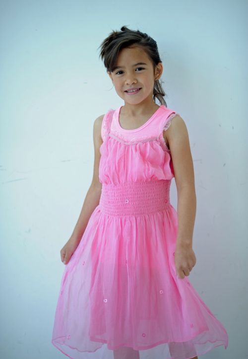 girl pink dress posing
