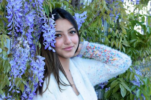 girl brown eyes flowers