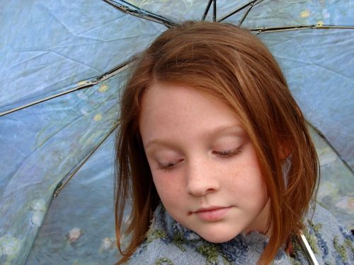 girl pensive rain