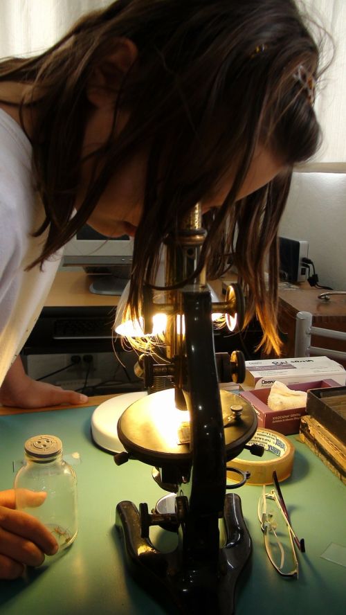 girl microscope science