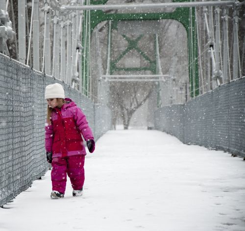 girl snow bridge
