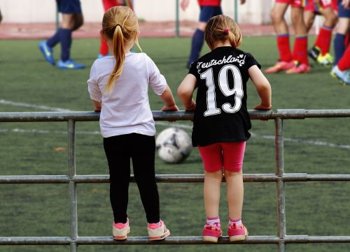 girl fence football