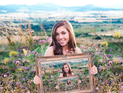 girl holding a frame portrait