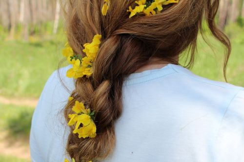 girl pigtail flowers in her hair