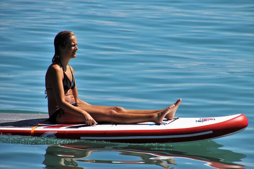 girl  sup  on the water
