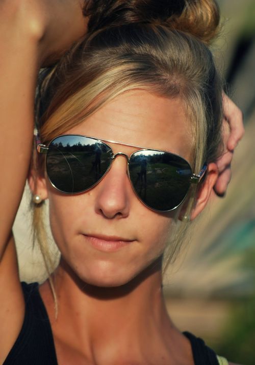 girl sunglasses pose