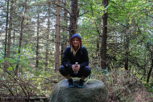 girl rock hiking