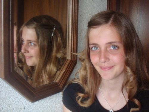 girl mirror image happy