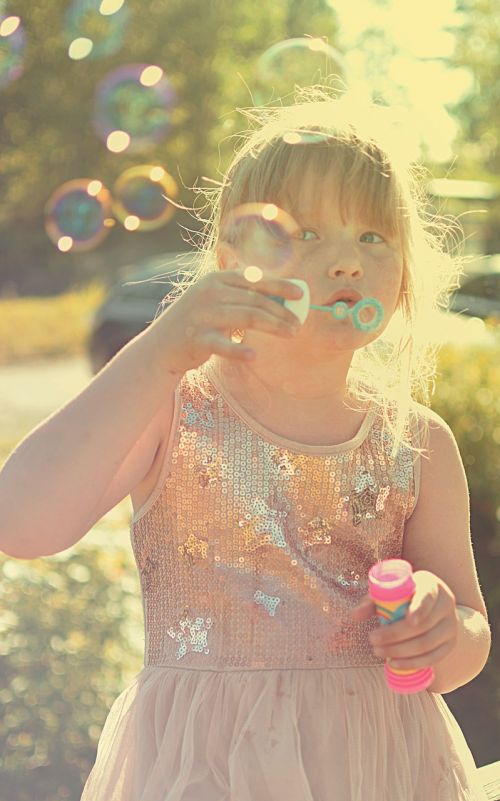 girl soap bubbles summer