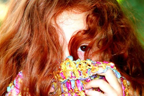 girl red hair hidden