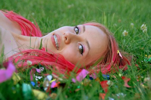 girl pink hair grass