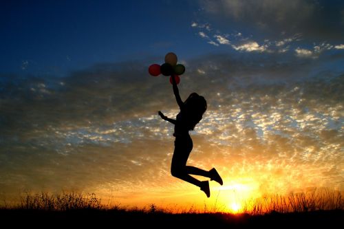 girl sunset balloons