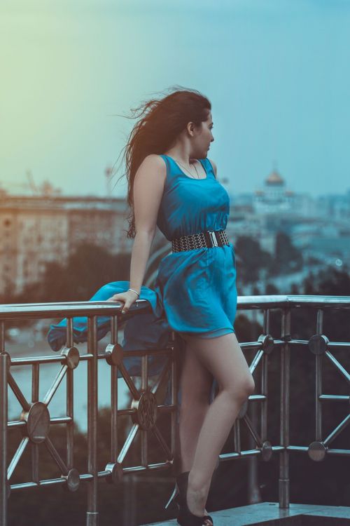 girl in blue dress long hair girl