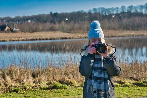 girl photographing  child  camera