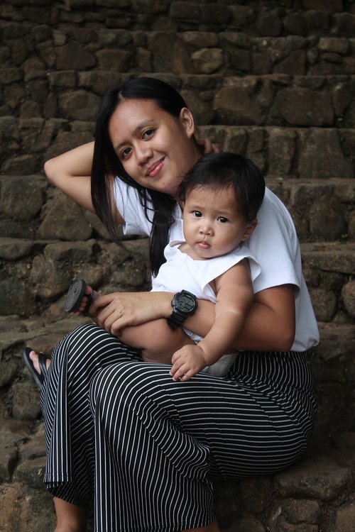 girl with a cute  sad  adorable baby