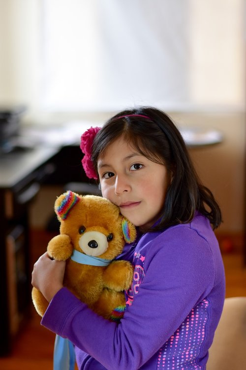 girl with teddy bear  portrait  foreground