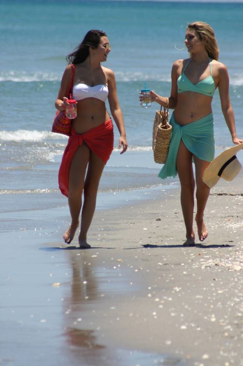 girls walking beach
