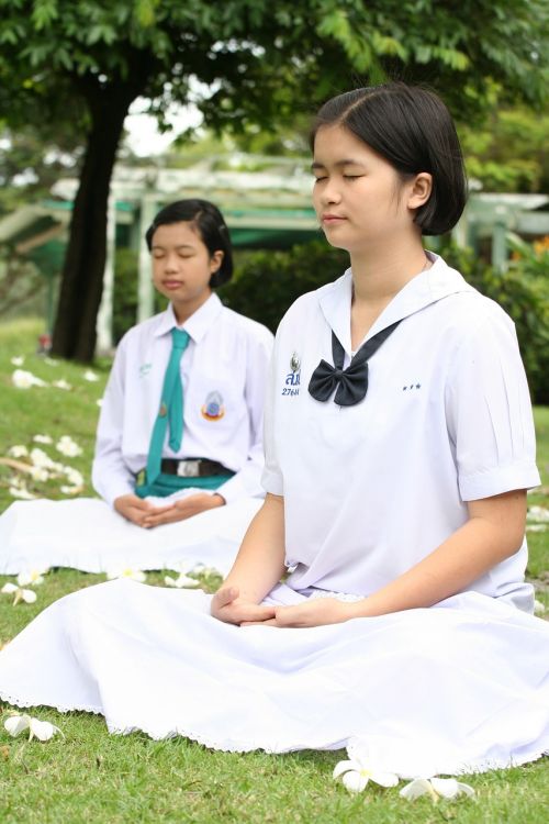 girls meditating buddhist