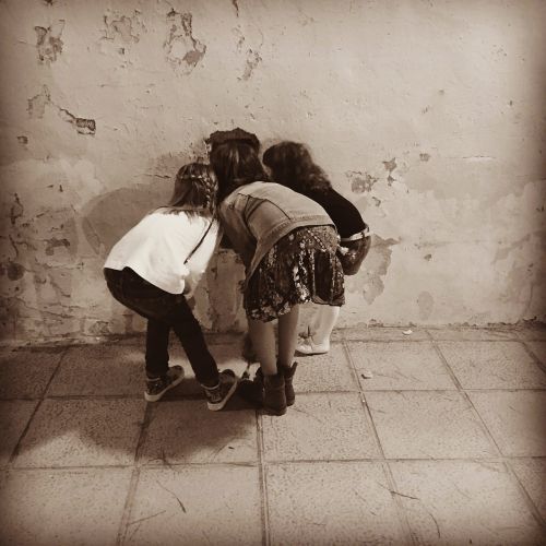 girls children playing sepia-toned