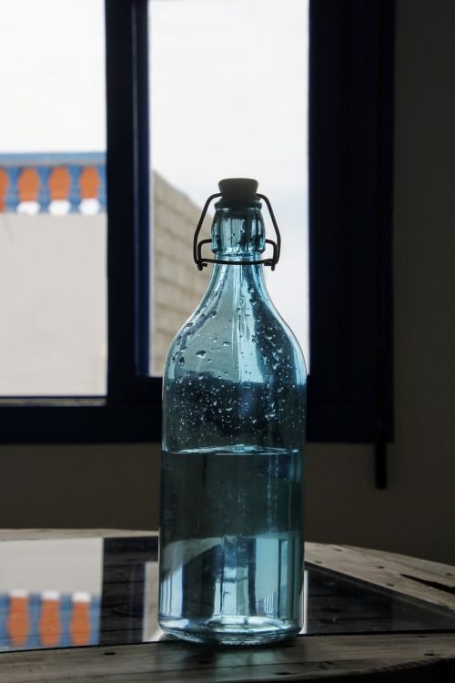 glass bottle blue water