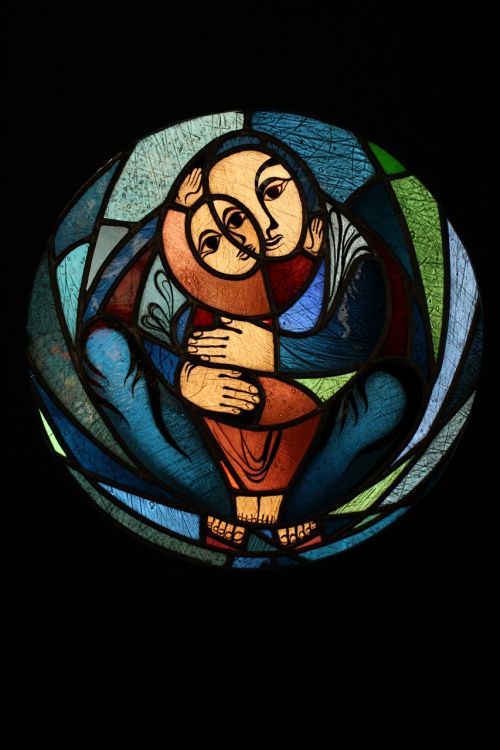 glass window kevin schneider-lang mother with child