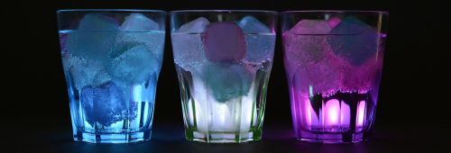 glasses ice cubes illuminated