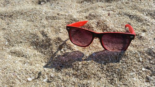 glasses beach sand