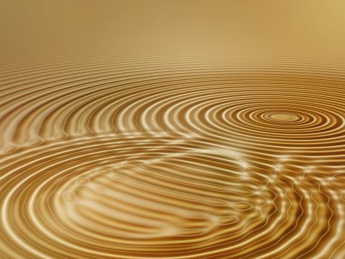 gold waves circles water
