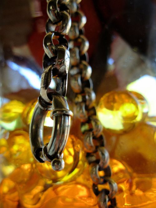 gold chain glasses abstract