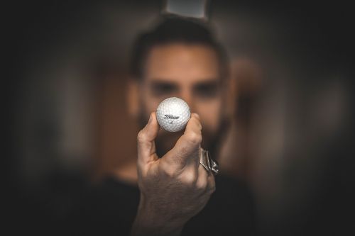 golf ball hand macro