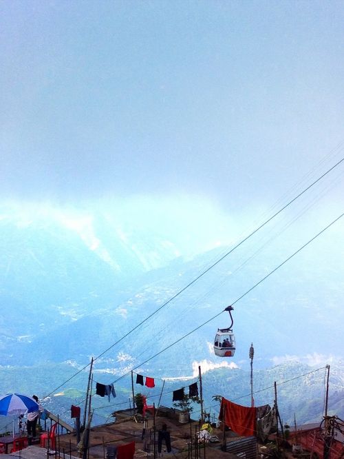 gondola lift mountains peaks
