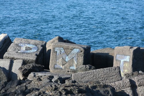 graffiti  breakwater  sea